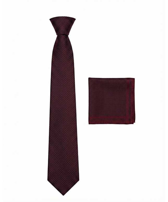 Burgundy patterned tie and pocket square set on a white background