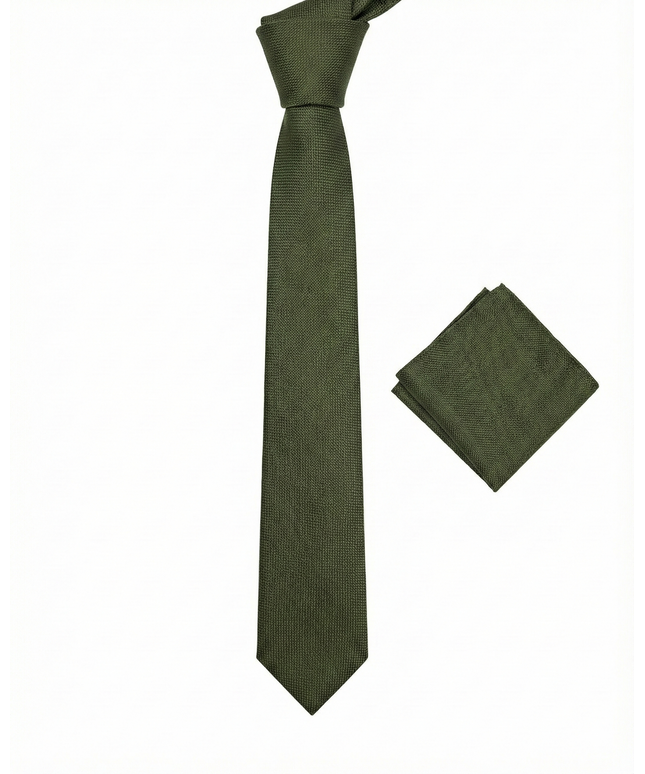 Green tie and matching pocket square on a white background