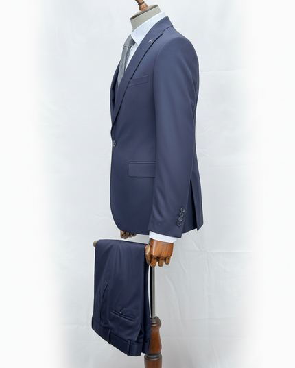 Gray suit on a mannequin against a white background