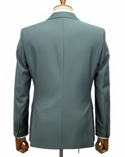 Green suit jacket on a mannequin against a white background