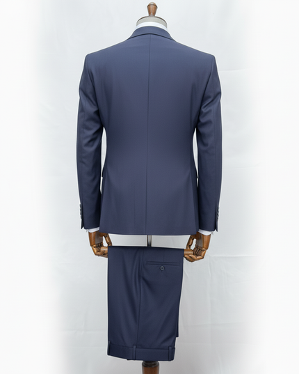 Blue suit on a mannequin against a white background