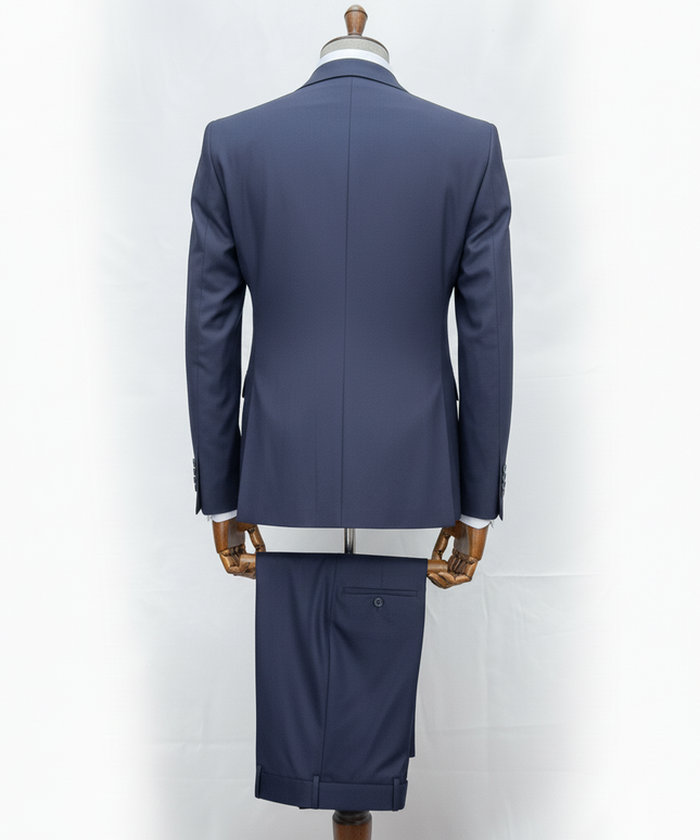 Blue suit on a mannequin against a white background