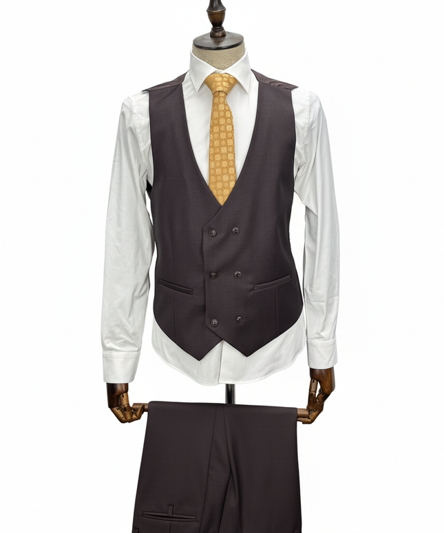 Burgundy vest with a white shirt and yellow tie on a mannequin against a white background