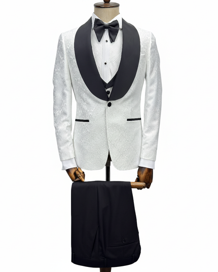 White tuxedo with black lapels on a mannequin against a white background