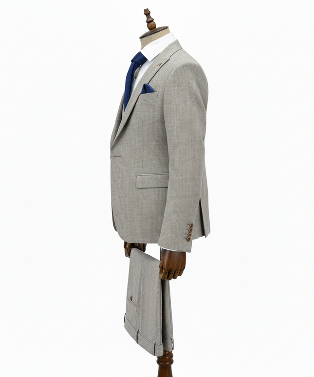Beige  checkered suit on a mannequin against a white background