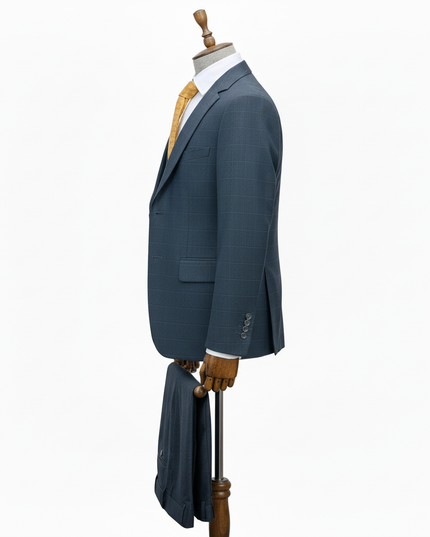 Slate Blue suit jacket on a wooden mannequin against a white background