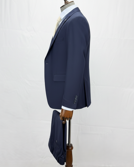 Navy blue suit jacket on a mannequin against a white background