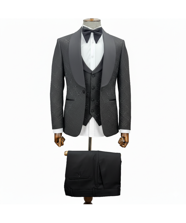 black tuxedo with matching vest and pants on a mannequin against a white background