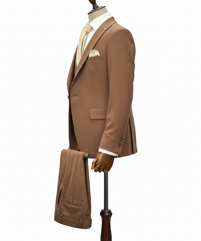 Brown suit on a mannequin with a white background