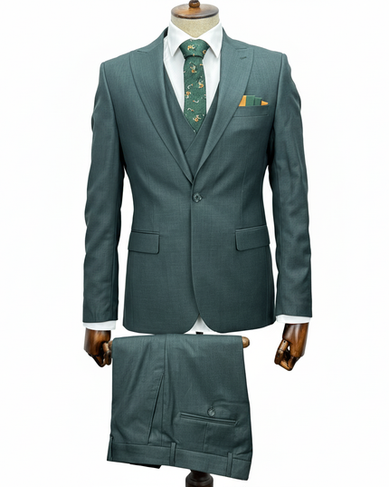 Green suit with matching tie on a mannequin against a white background