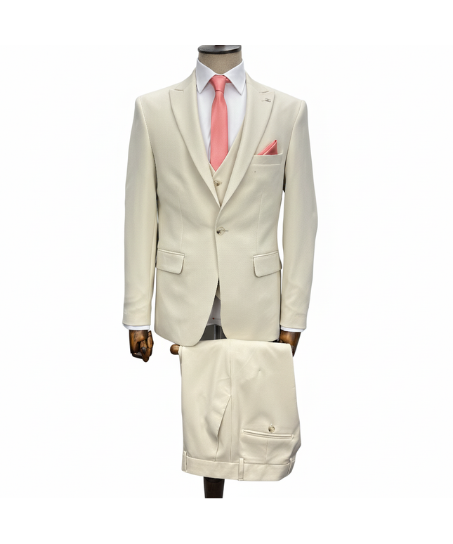 Beige suit with pink tie on a mannequin against a white background