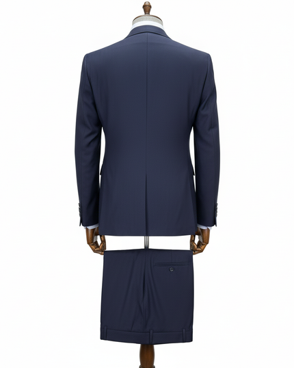 Navy blue suit jacket and pants on a mannequin against a white background