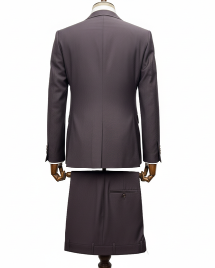 Burgundy suit on a mannequin against a white background