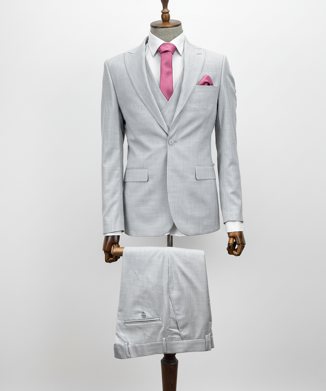 Light gray suit with pink tie on a mannequin against a white background