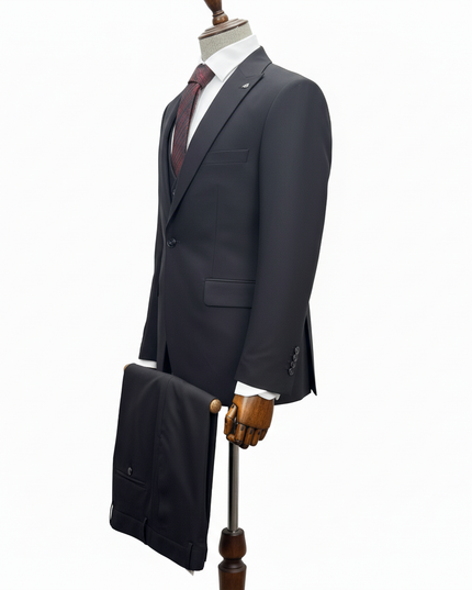 black suit on a mannequin with a white background