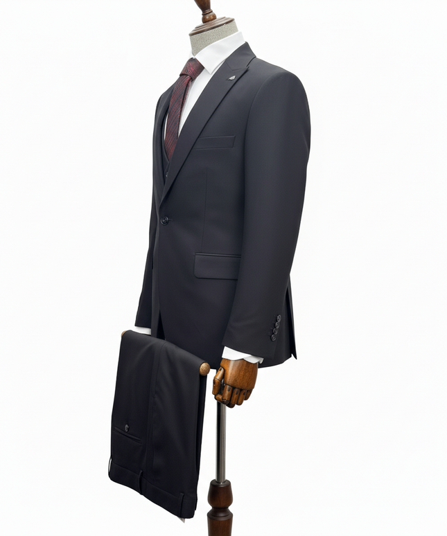 black suit on a mannequin with a white background