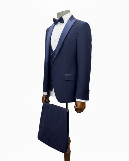 Navy blue tuxedo with matching bow tie on a mannequin against a white background