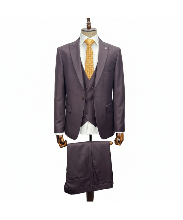 Burgundy suit with a yellow tie on a mannequin against a white background