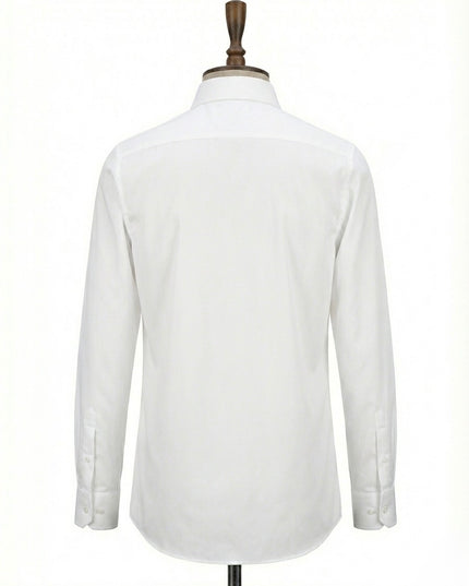 White dress shirt on a mannequin against a white background