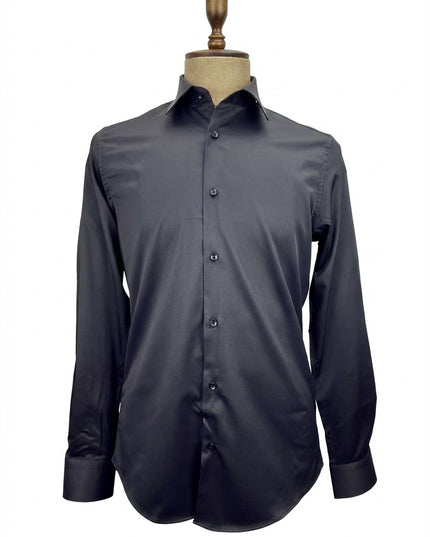 Dark gray dress shirt on a mannequin against a white background