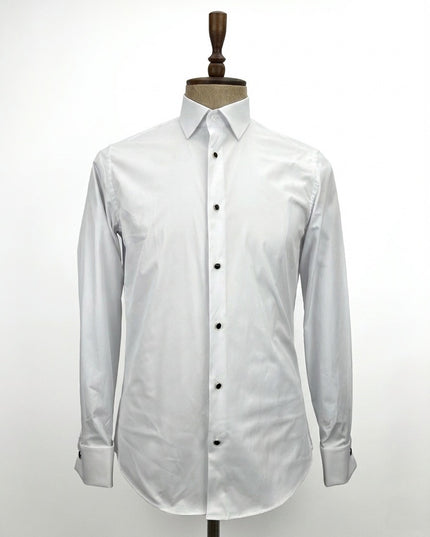 White dress shirt on a mannequin against a white background