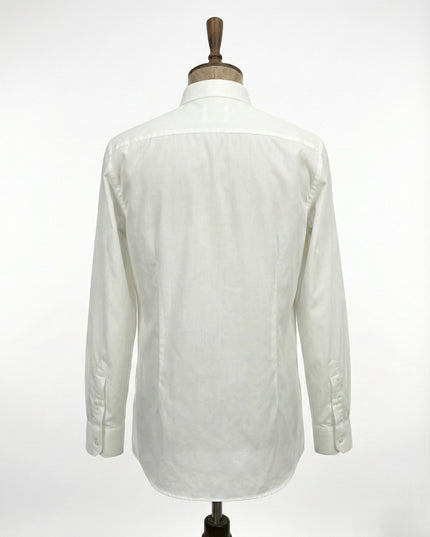 White shirt on a mannequin against a white background